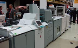 Produkční tiskový systém Océ VarioPrint řady 2100 Titanium s nejvyšším pětihvězdičkovým oceněním od společnosti Bertl Produkční tiskový systém Océ VarioPrint řady 2100 Titanium s nejvyšším pětihvězdičkovým oceněním od společnosti Bertl